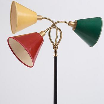 Josef Frank, a brass and black lacquered floor lamp model "2431", Firma Svenskt Tenn, Sweden.