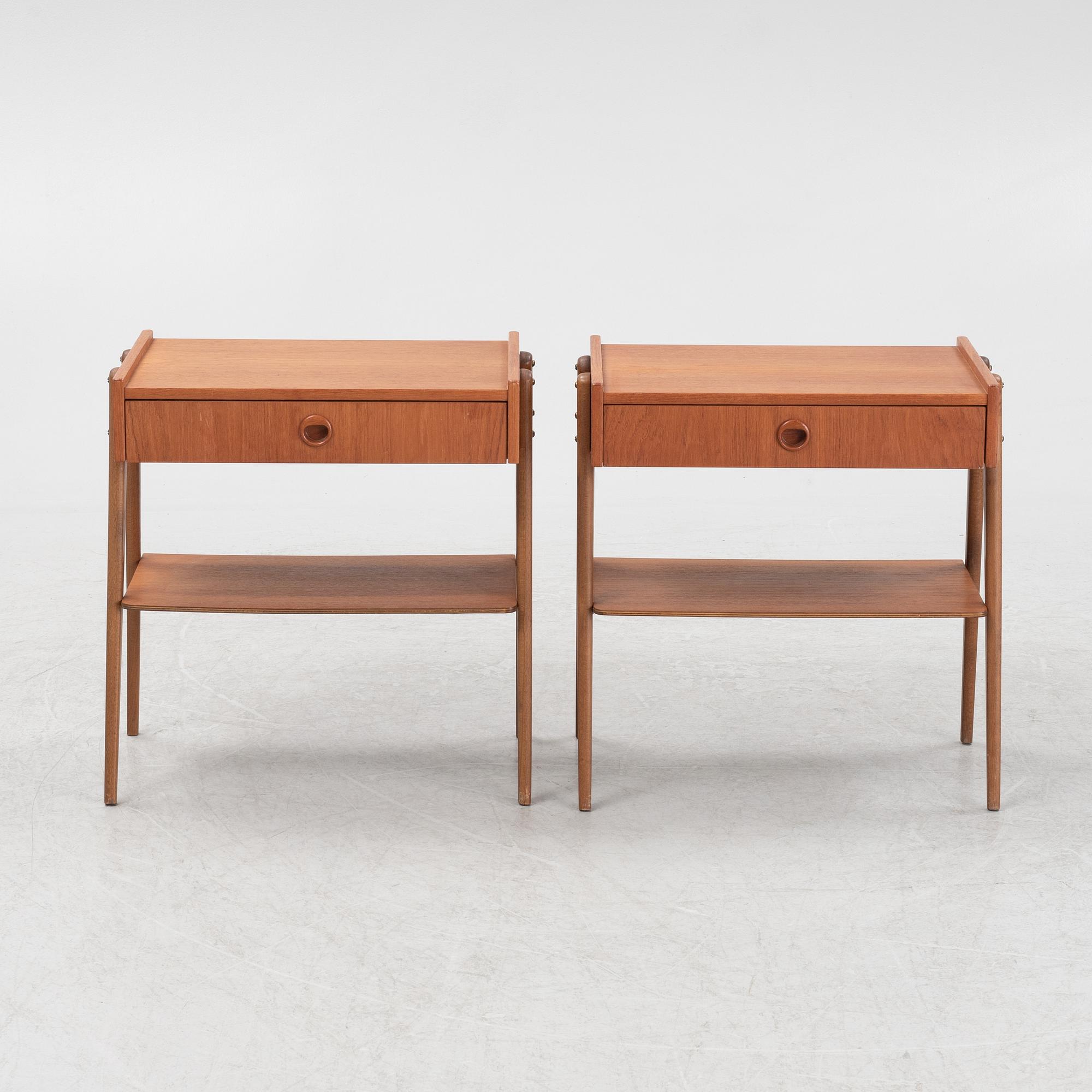 A pair of teak veneered bedside tables, 1950's/60's.