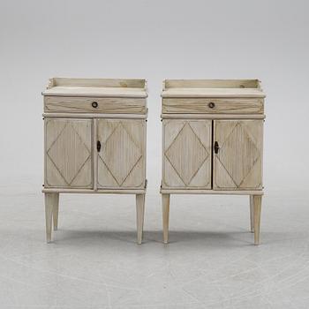 A pair of Gustavian style bedside tables, first half of the 20th century,.