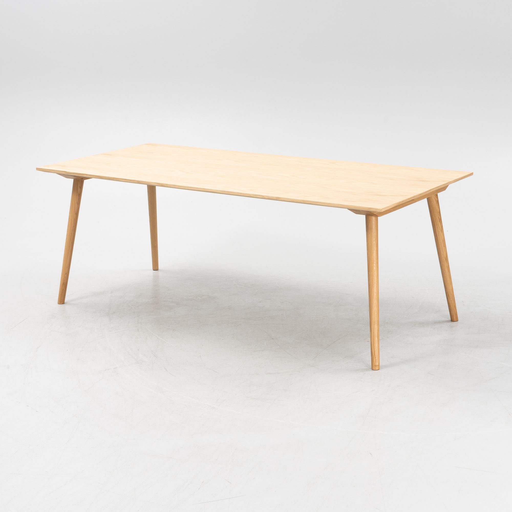 Sami Kallio, an oak veneered 'In Between' dining table from &tradition.