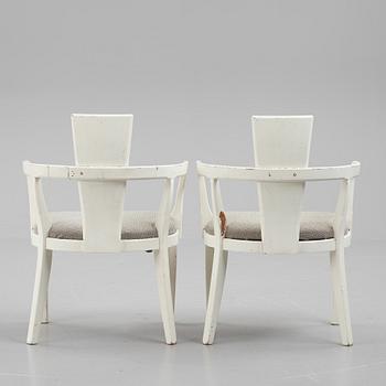 A pair of painted armchairs, first half of the 20th Century.