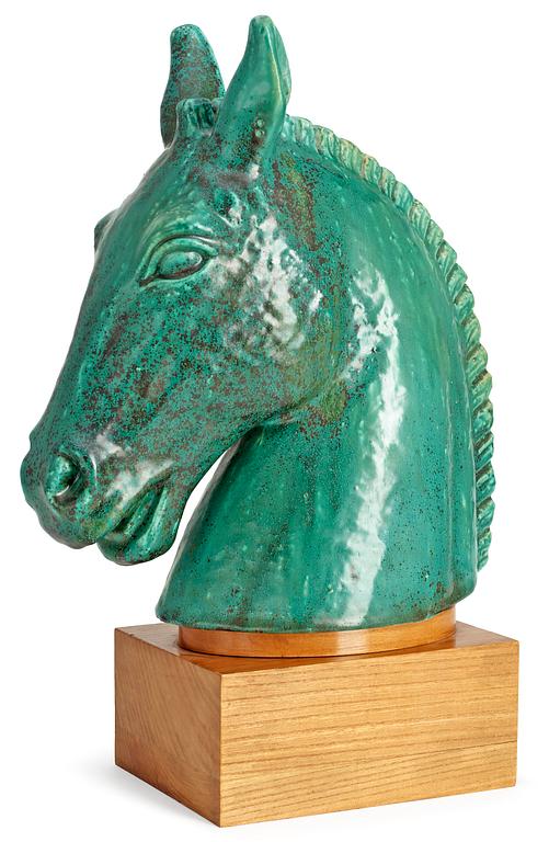 A Gunnar Nylund figure of a horse's head.