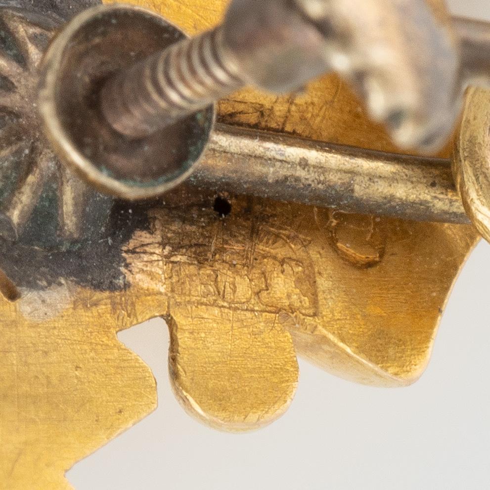 A necklace and a pair of earrings 18K gold, 19th century.