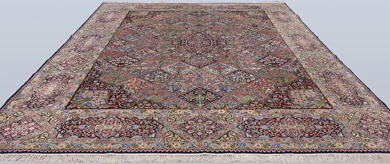 A Kirman lavash milifleur carpet, 400 x 310 cm.
