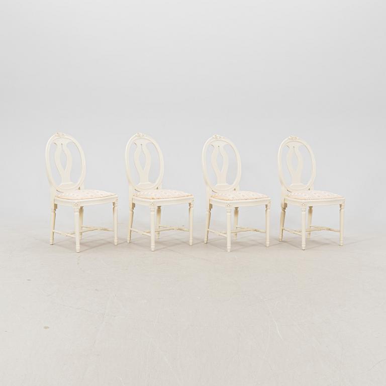 A late 20th century painted Gustavian style 5 pcs dining suit.