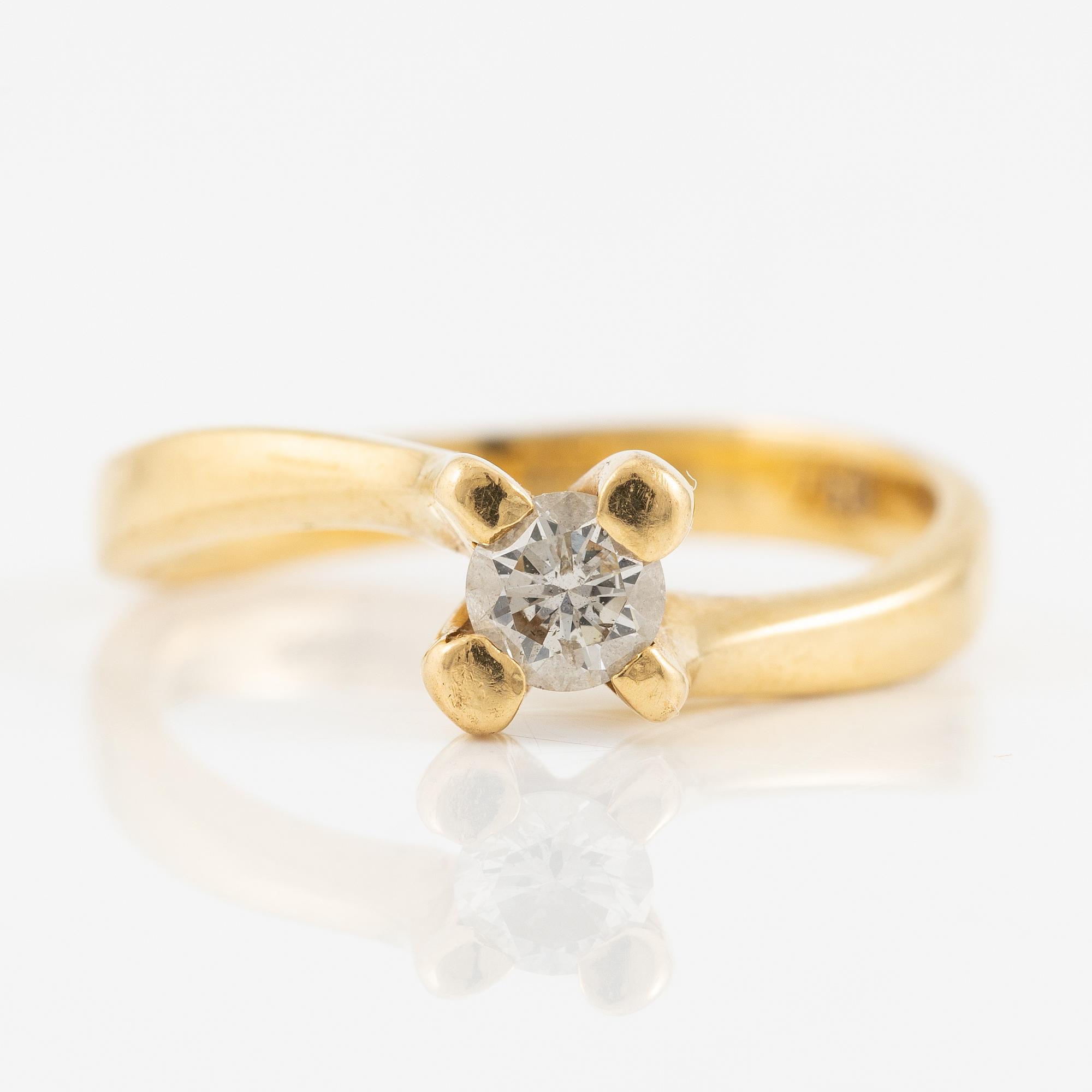 Ring, 18K guld med briljantslipad diamant.