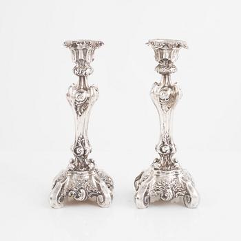 A Pair of Swedish Rococo-Revival Silver Candlesticks, Gustaf Möllenborg, Stockholm 1843-46.