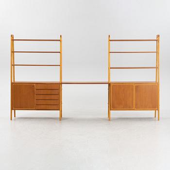 A pair of mid 20th century teak bookshelves.