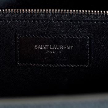 A bag by Yves Saint Laurent, "Sac du jour".