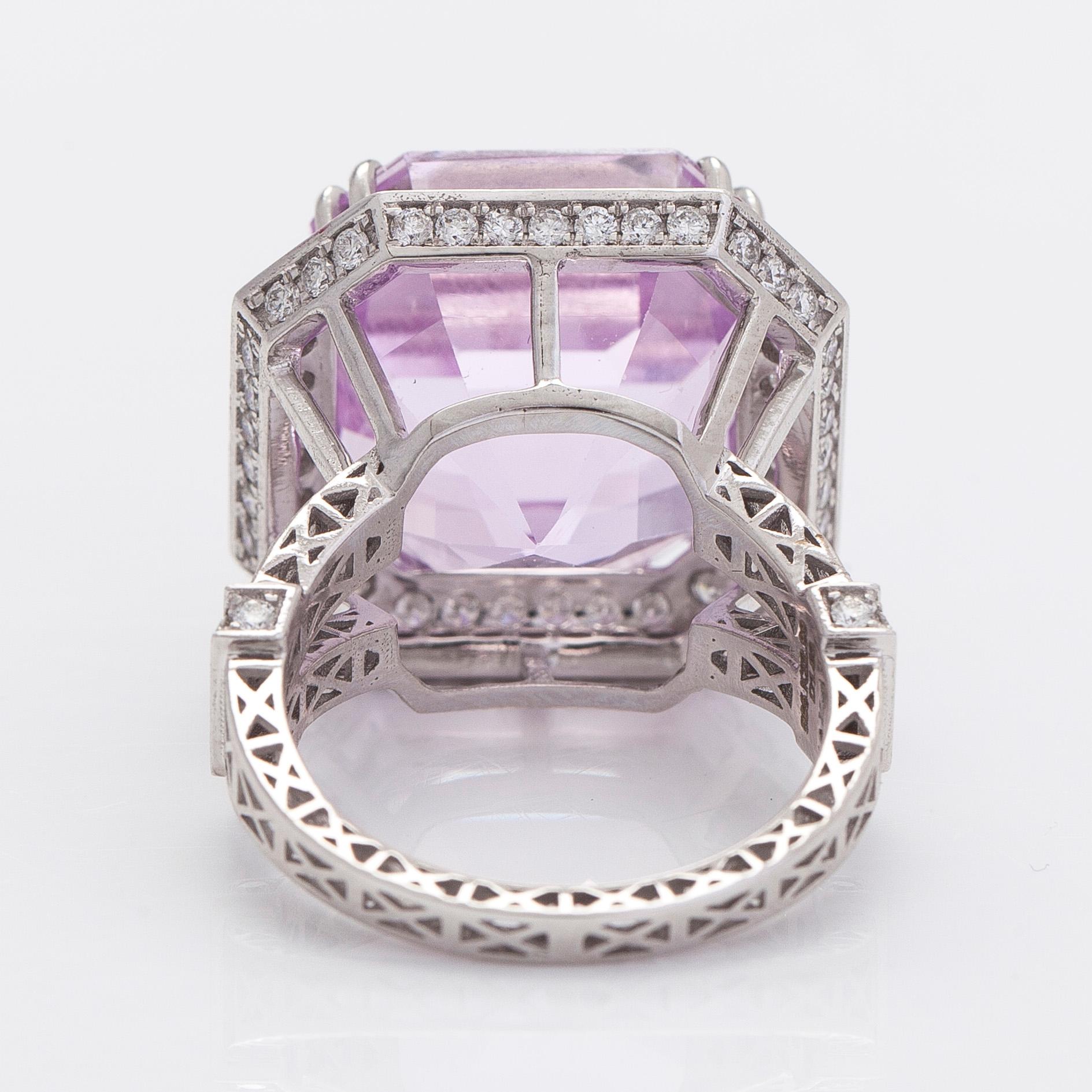 A 14K gold ring with kunzite and diamonds.