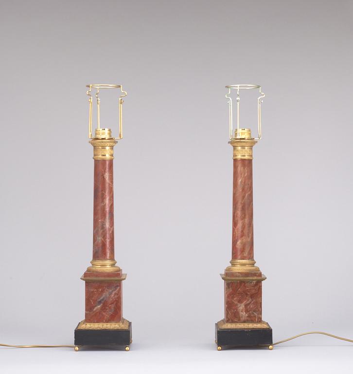 A pair of French first half 19th century table lamps.