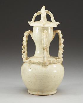 A pale green glazed vase with cover, Yuan dynasty (1271-1368).