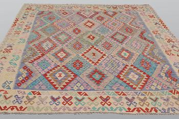 A carpet, kilim, ca 290 x 257 cm.