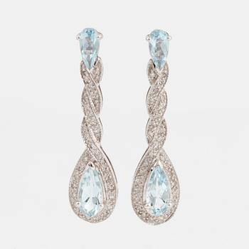 Pear faceted aquamarine and eight cut diamond earrings.