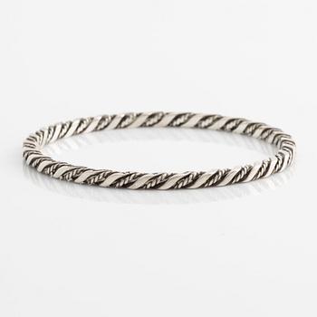 A Georg Jensen bangle in sterling silver.