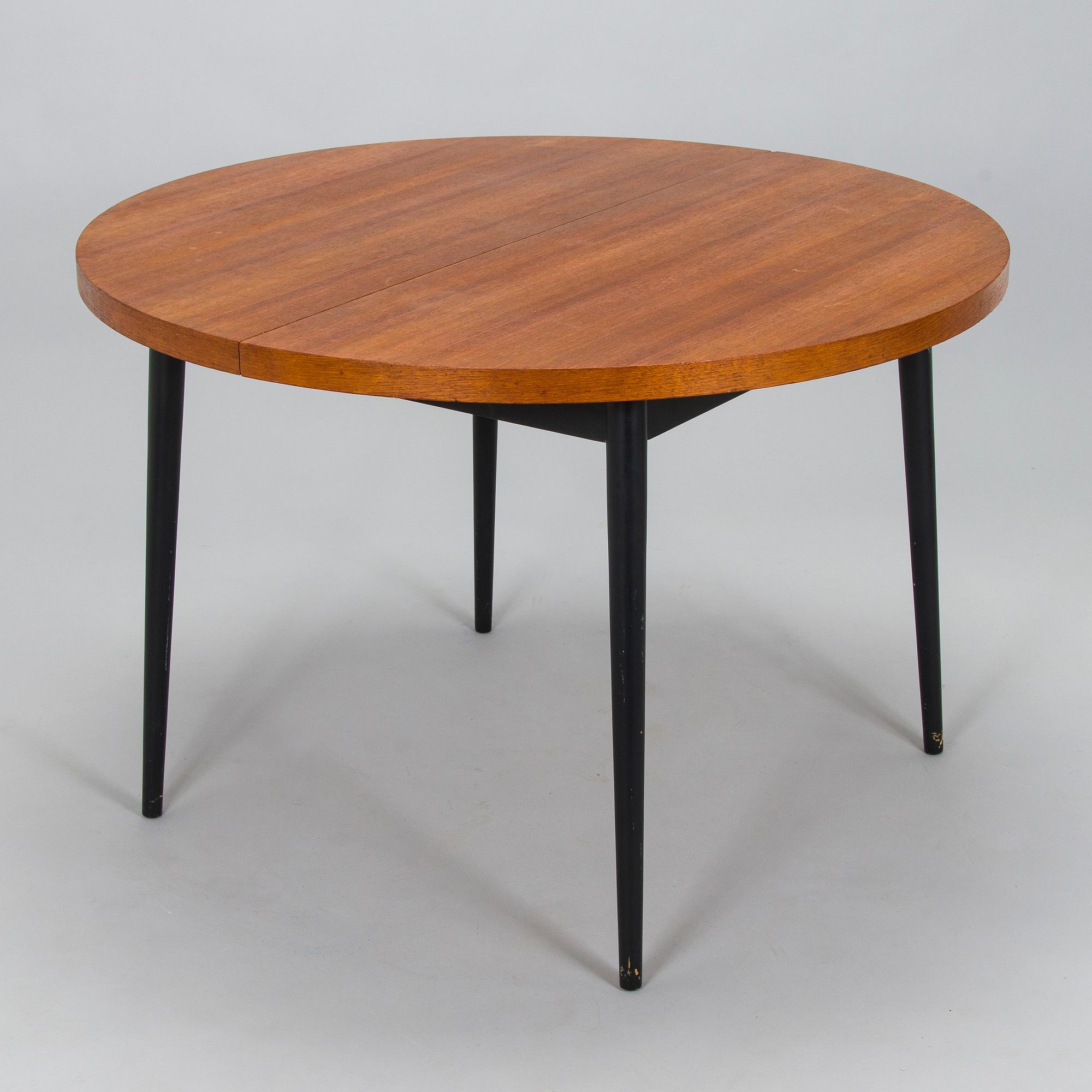 A mid-20th century dining table.