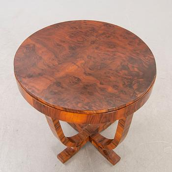 An Art Deco walnut coffee table first half of the 20th century.
