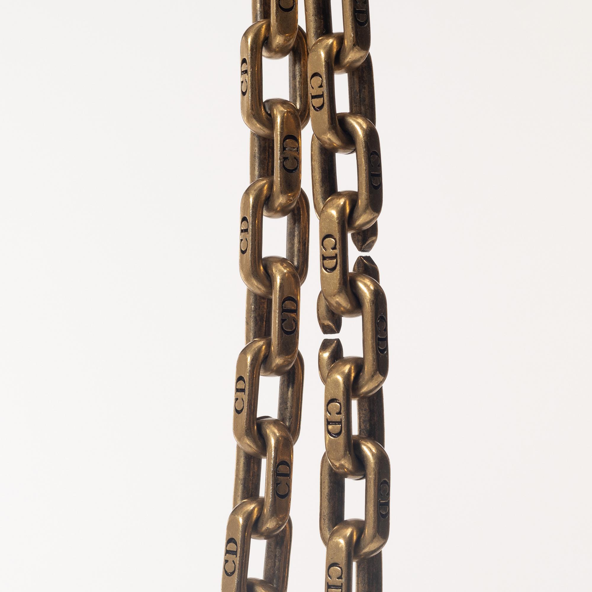 Christian Dior, A black leather "Dio(r)evolution" bag.