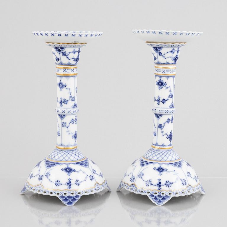 A pair of 'Blue Fluted Full Lace' porcelain Candle sticks, Royal Copenhagen, model number 1008, post 1923.