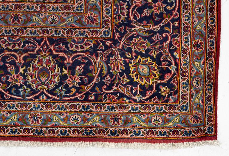 A Keshan carpet, central Iran, signed c, 392 x 301 cm.