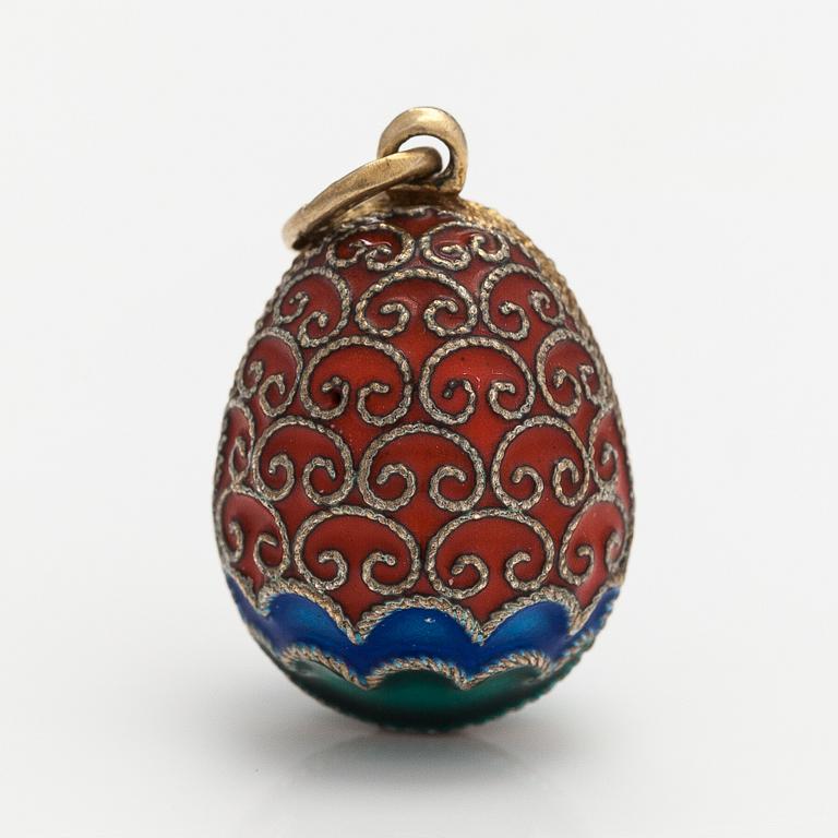 An egg pendant made of sterling silver and enamel. Import marked Kultakeskus, Helsinki.