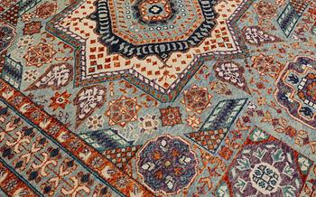 An Oriental carpet, c. 296 x 249 cm.