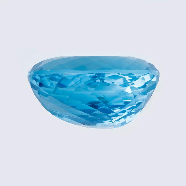 TOPAS, blå, oinfattad, ca 105,25ct enl cert, Cert IGEC medföljer.