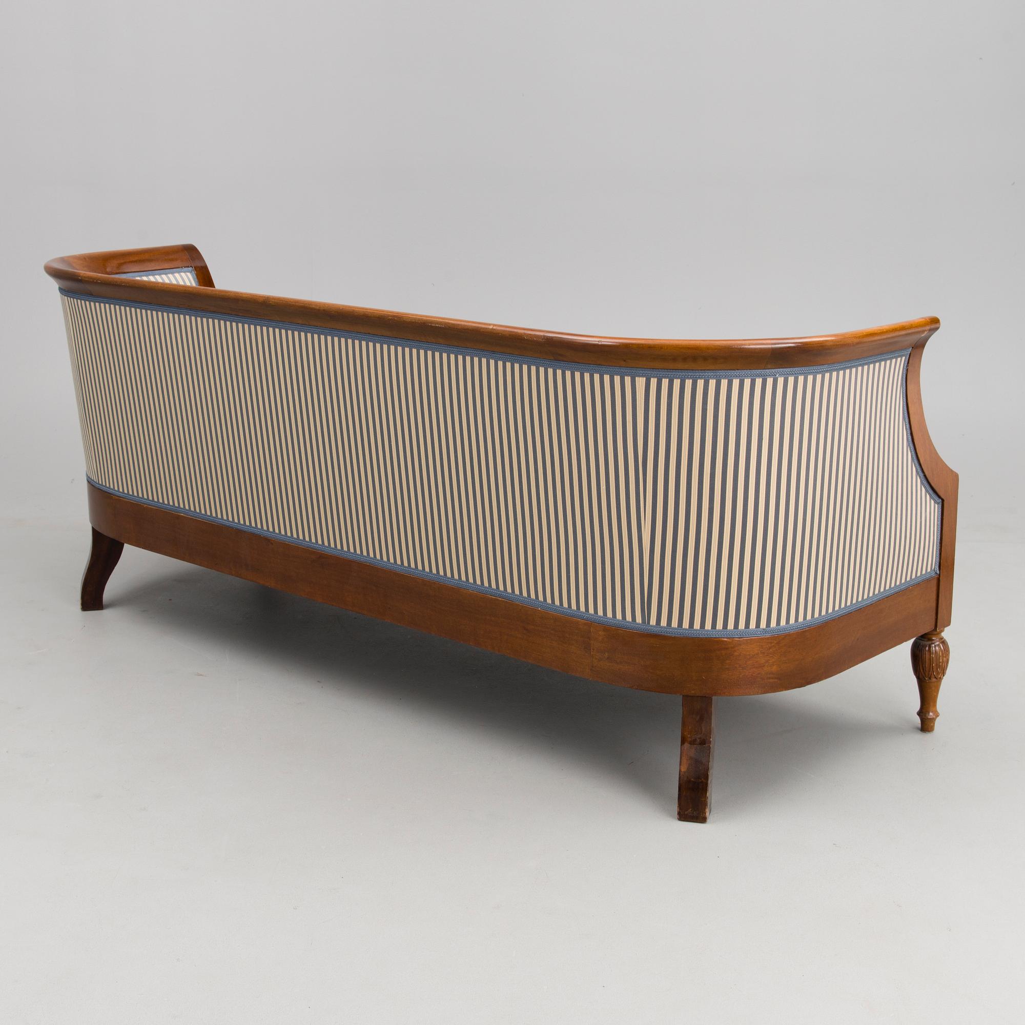 A mid-late 19th Century four-piece sofa suite.