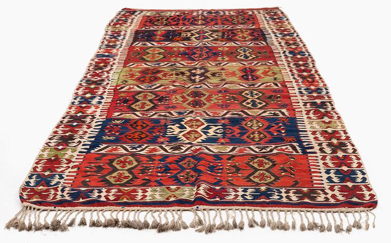 An antique southeast Anatolian kilim, c. 412 x 163 cm.