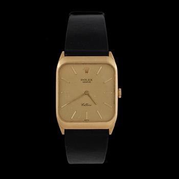 Rolex - Cellini. Manuell. Guld/läderband. 31x26mm. Ca 1980/90-tal. Boettnr. 4322620. Ref. 4135.