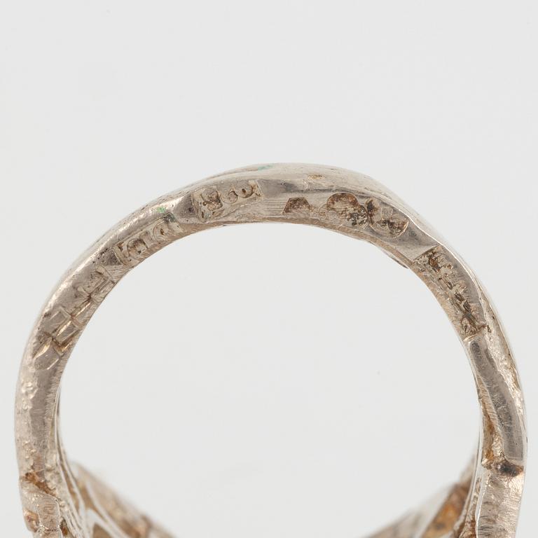 Lars Arby, four rings, sterling silver and enamel, Gothenburg 1966 and 1976.