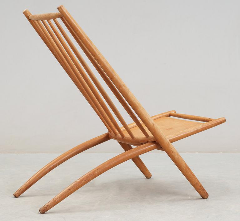 An Ilmari Tapiovaara beech 'Kongo' folding chair, Asko, Finland.