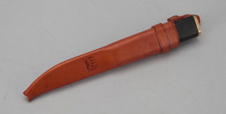 PUUKKO-KNIV, rostfritt stål, nylon och mässing, Tapio Wirkkala, Hackman Finland, formgiven 1961.