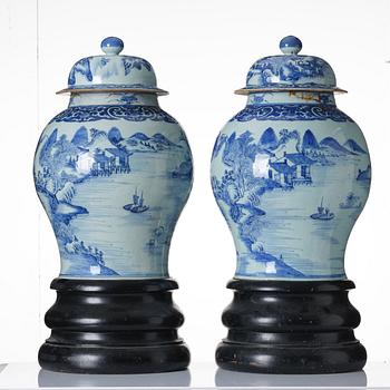 A pair of large blue and white vases with covers, Qing dynasty, Qianlong (1736-95).