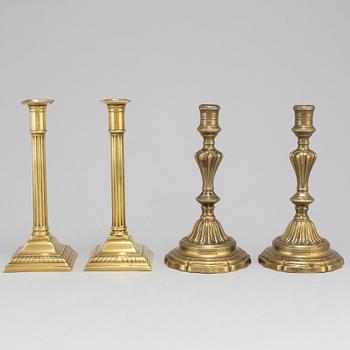CANDLESTICKS, two pairs, brass, 18th and 19th century.