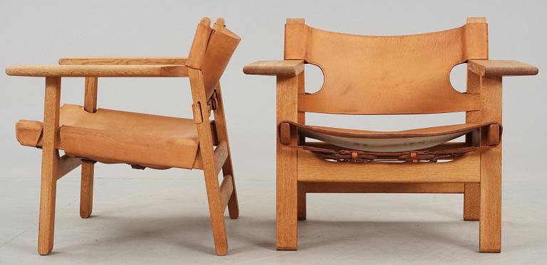 A pair of Børge Mogensen oak and leather 'Spanish chairs', Fredericia stolefabrik, Denmark.