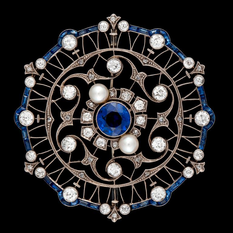 A cultured pearl, old-cut diamond and synthetic sapphire brooch.