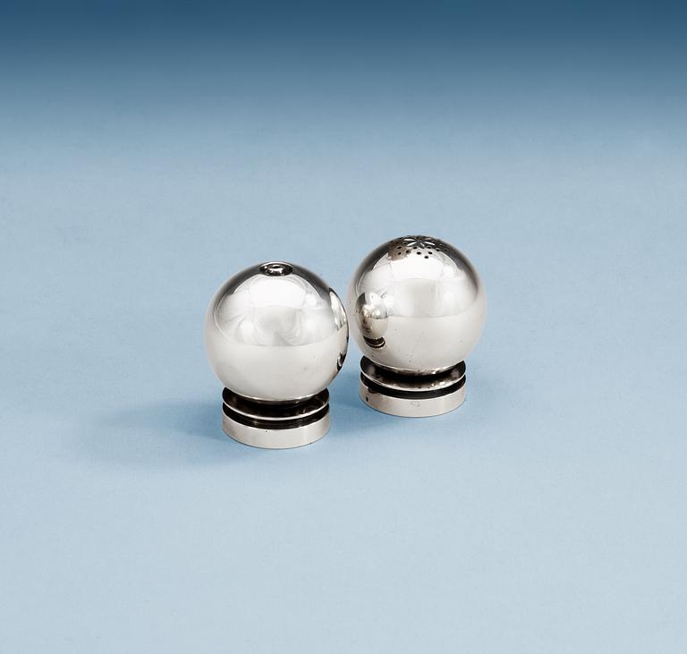 A pair of Harald Nielsen sterling salt and peppers by Georg Jensen & Wendel, Copenhagen 1945-51,