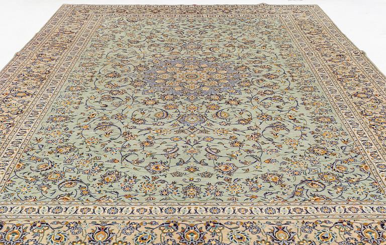A semi-antique Keshan carpet, signed, c. 477 x 300 cm.