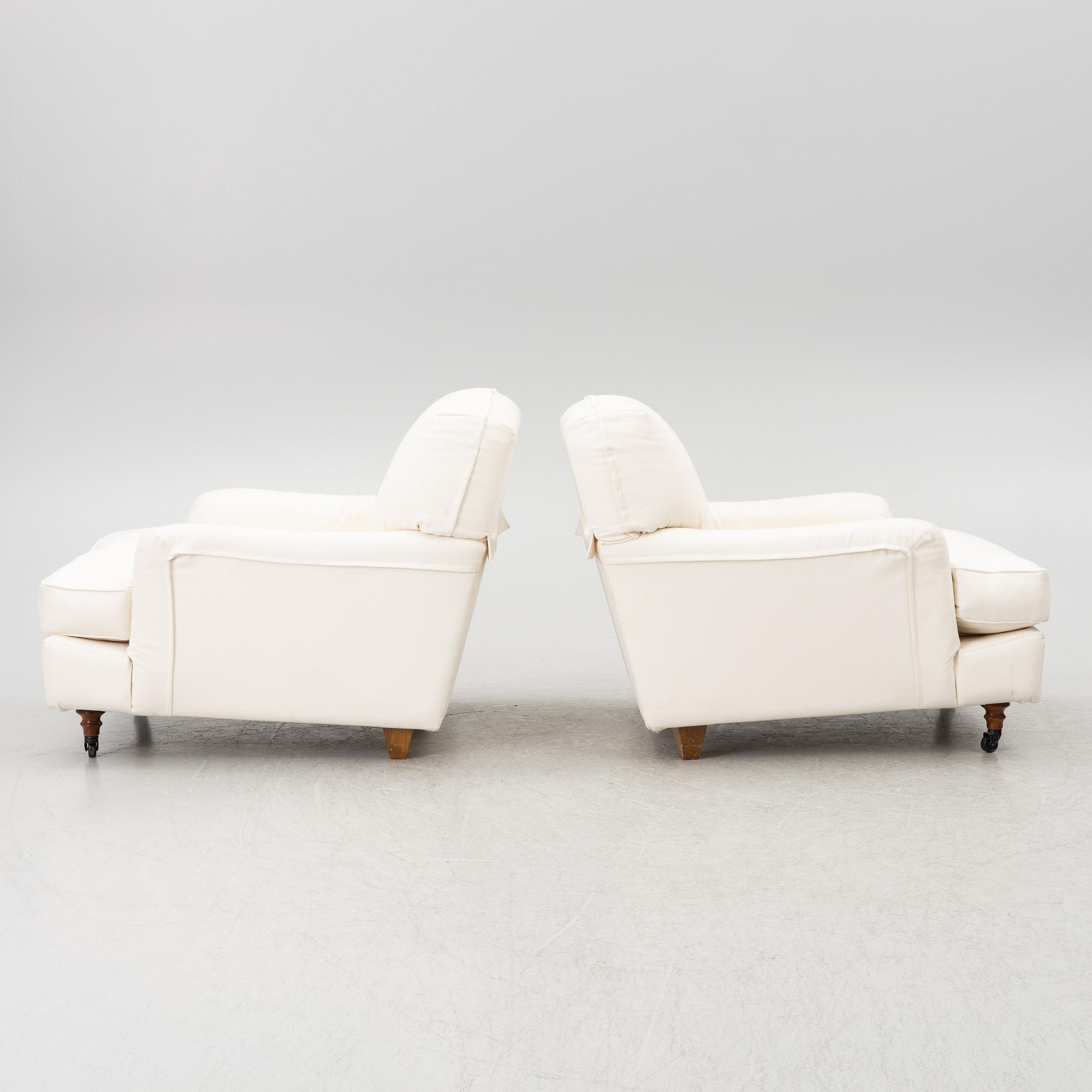 Vico Magistretti, a pair of 'Raffles' armchairs, De Padova, Italy, 21st century.