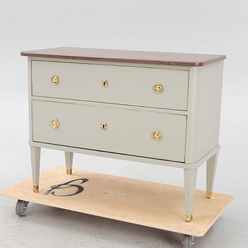 A painted  dresser with a stone top. Early 20th century.