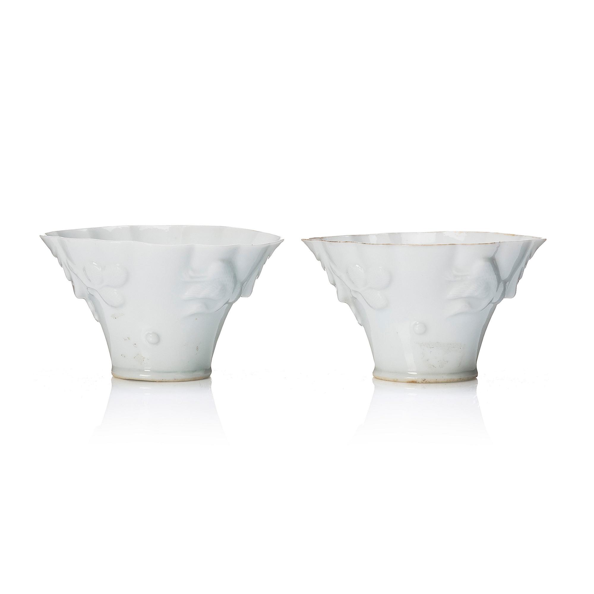 A pair of blanc de chine libation cups, Qing dynasty, 19th Century.