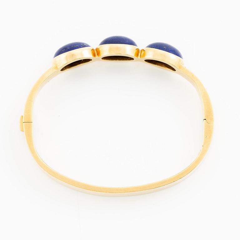 Wiwen Nilsson, a bracelet, 18K gold with lapis lazuli, Lund 1965.