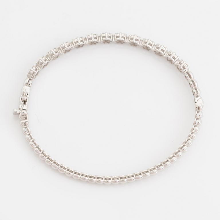 Brilliant cut diamond bangle.