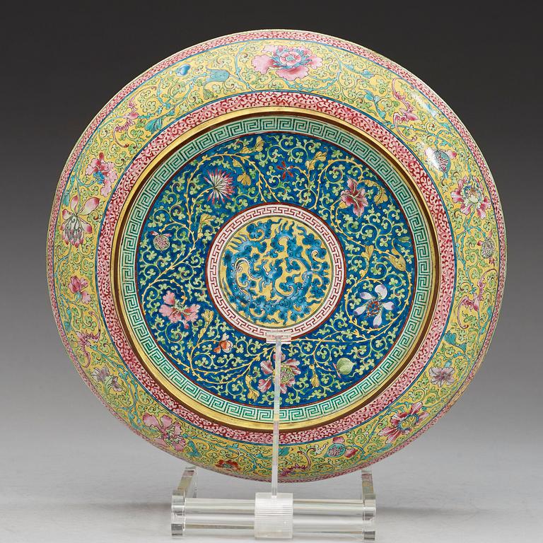 An enamel on copper dish, Qing dynasty 18th century.