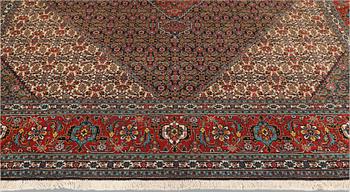 A carpet, Tabriz, c. 40 raj, c. 390 x 298 cm.