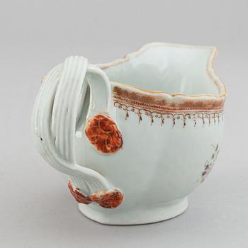 Two famille rose serving dishes and a sauce boat, Qing dynasty, Qianlong (1736-95).
