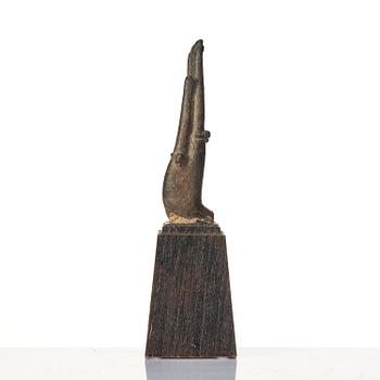A bronze sculpture of buddhas hand, Thailand, 17th century.