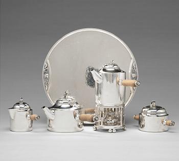 169. Georg Jensen, a set of five pieces tea and coffee service with a tray, Argenterie d'Art de Georg Jensen, Copenhagen, ca 1930-38.