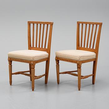 A pair of gustavian chairs, early 19th century.